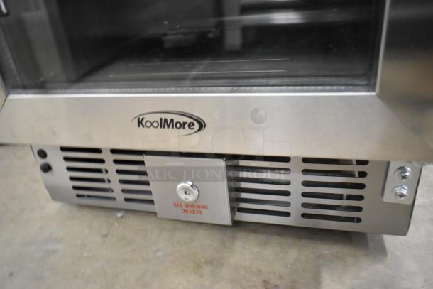 Stainless steel KoolMore KM-BIR3C-GD beverage cooler with glass door, logo visible, showing venting and lock; new condition.