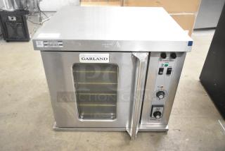 2025 Garland MCO-E-5-C Stainless Steel Commercial Electric Powered Half Size Convection Oven w/ View Through Door, Metal Oven Racks and Thermostatic Controls. 230/240 Volts, 1 Phase. - Item #1224516
