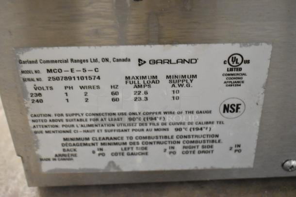 2025 Garland MCO-E-5-C convection oven label displaying model, voltage, phase, amps, and safety certifications.
