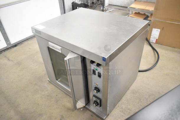 2025 Garland MCO-E-5-C stainless steel half-size convection oven, with view-through door and thermostatic controls.