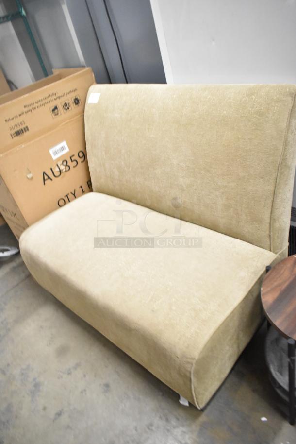 Single-sided booth seat with beige upholstery and matching wooden end table. Sold as a lot of 2 items.