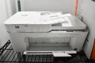 HP DeskJet Plus 4155 printer on a shelf, white color, excellent condition, visible logo. Auction tag indicates item 58.