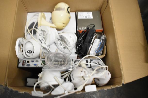 Hikvision 4K NVR Security Camera Kit, includes multiple cameras, cables, and hard drive, boxed, moderate wear, functional.