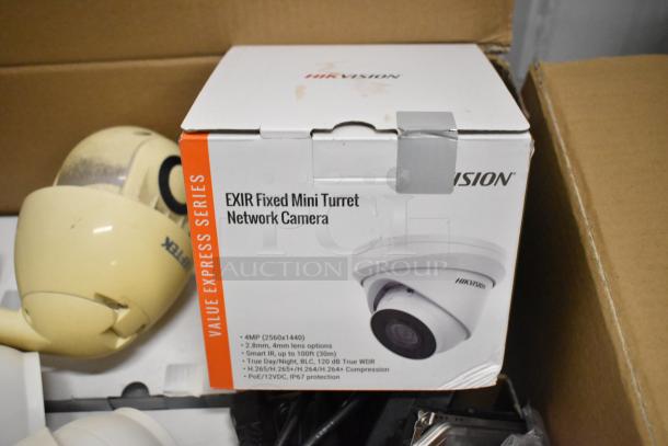 Hikvision 4K NVR Security Camera Kit box, EXIR Fixed Mini Turret, 4MP, smart IR, PoE/12VDC, IP67, new condition.