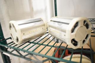 Box of Philips LED lightbulbs, cylindrical shape, metallic with visible LED diodes, unused condition.