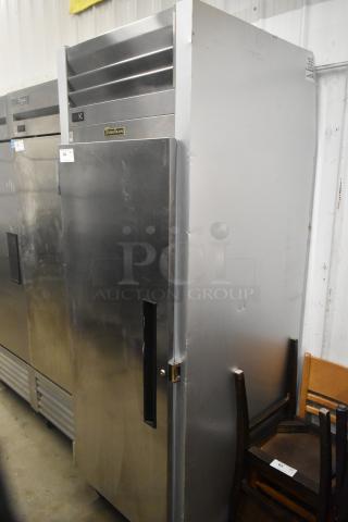 2022 Traulsen SB1G-10011-032A stainless steel single door reach-in cooler, poly coated racks, on casters, 115V, 1 phase.