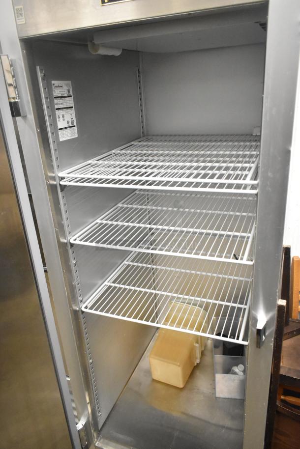 2022 Traulsen SB1G-10011-032A stainless steel single door cooler, poly coated racks, commercial casters, 115V, 1 phase.