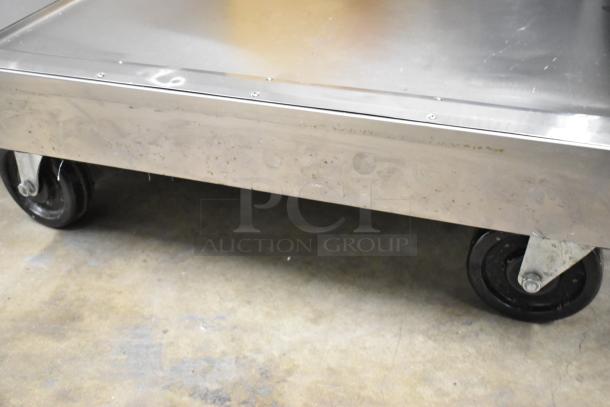 2022 Traulsen SB1G-10011-032A stainless steel cooler; single door, poly coated racks, commercial casters, 115V, 1 phase.