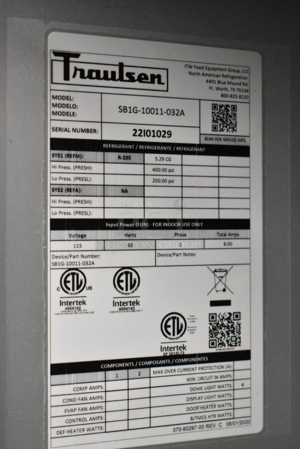 Label on 2022 Traulsen SB1G-10011-032A cooler, stainless steel, single door, poly coated racks, commercial casters, 115V.