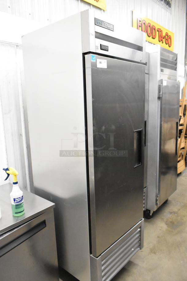 2020 True T-23F-HC stainless steel single door reach-in freezer with poly-coated racks and commercial casters.