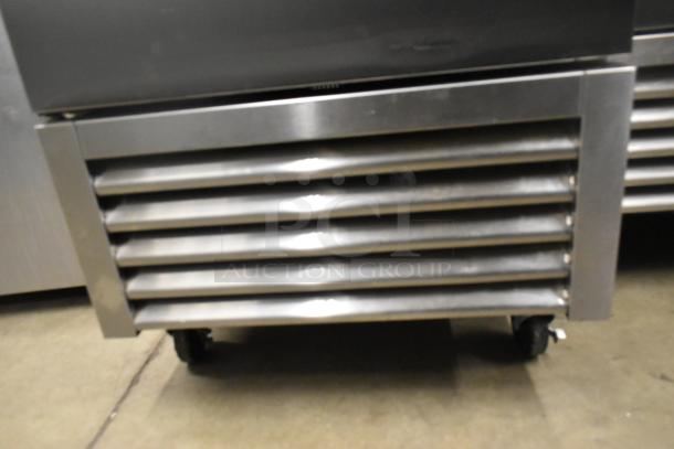 2020 True T-23F-HC stainless steel freezer, single door, poly coated racks, commercial casters, 115 volts, good condition.