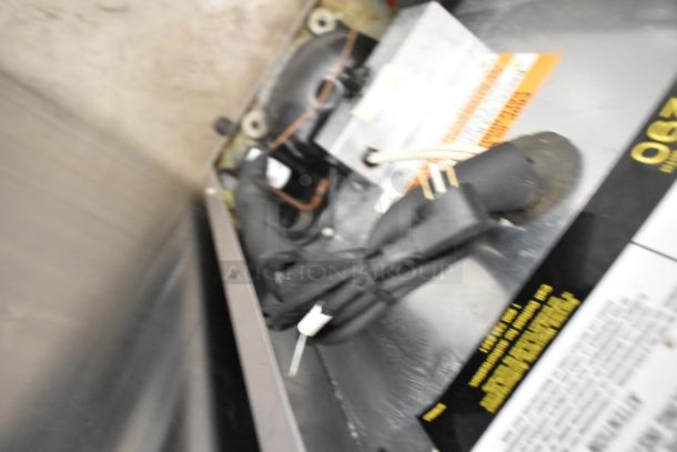 2020 Delfield 406P-STAR2 stainless steel undercounter cooler, commercial casters visible, 115V, 1 phase, good condition.