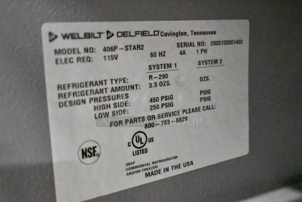 2020 Delfield 406P-STAR2 undercounter cooler label showing model, 115V, R-290 refrigerant, design pressures, NSF certified.