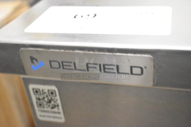 2020 Delfield 406P-STAR2 stainless steel undercounter cooler on casters, 115V, single door. Delfield logo visible.