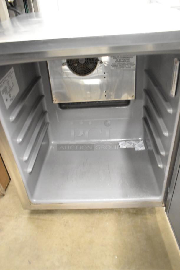 2020 Delfield 406P-STAR2 stainless steel undercounter cooler, single door, on casters. 115 volts, 1 phase, visible interior and fan.