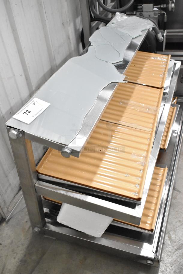 KoolMore stainless steel 2-tier display case, brand new, with broken glass top. Countertop merchandiser, scratch and dent.