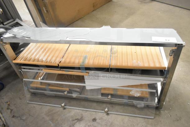 KoolMore stainless steel 2-tier display case, brand new with scratch and dent, featuring broken glass on the top tier.