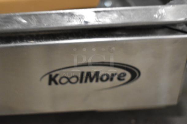 KoolMore stainless steel 2-tier display case, commercial countertop model, scratch and dent condition, visible KoolMore logo.
