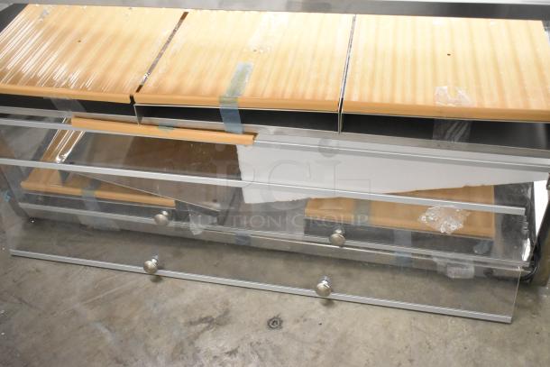 KoolMore stainless steel 2-tier display case with broken glass. Scratch and dent condition, brand new.