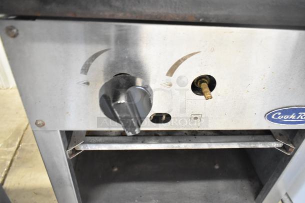 Cook Rite stainless steel commercial countertop gas burner, single stock pot range, used condition, with control knob and branding visible.