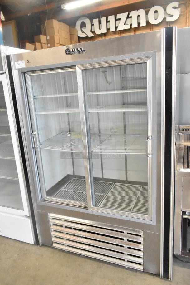 Dial Metal Commercial 2 Door Reach In Cooler, poly coated racks, 115V, 1 Phase, stainless steel, excellent condition.