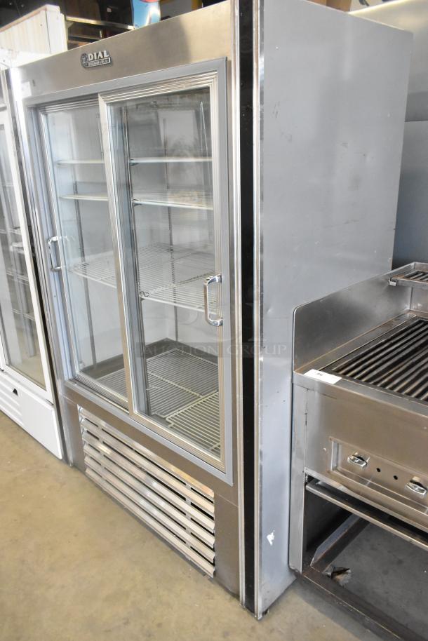 Dial Metal Commercial 2-Door Reach-In Cooler, features poly-coated racks, 115 volts, 1 phase, branded Dial, in used condition.