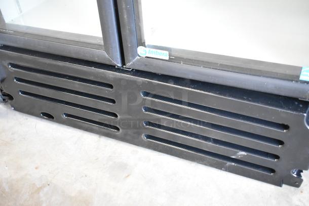 Imbera VRD37 commercial cooler with metal exterior, two doors, poly-coated racks, 115V, 1-phase. Imbera logo visible.