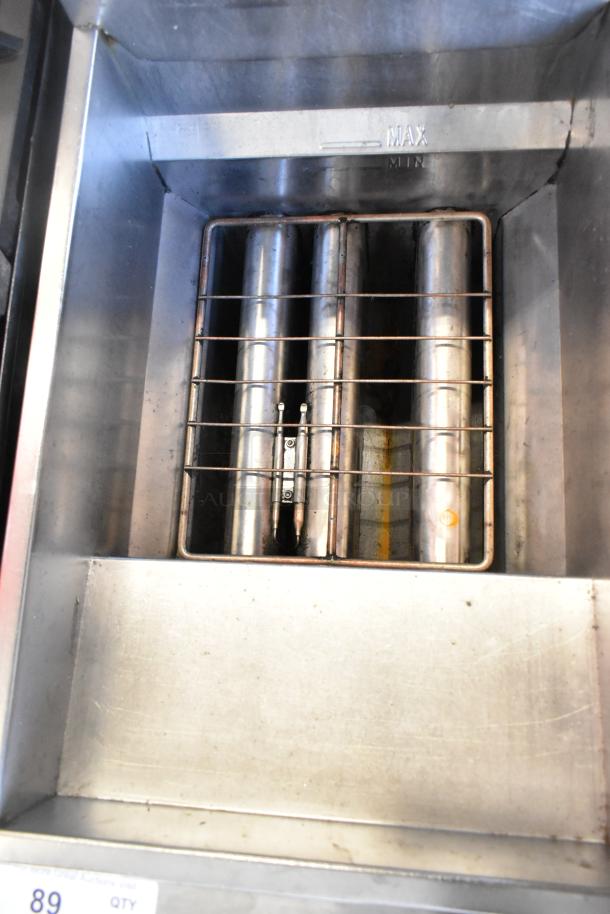 Sierra SRF-35/40NG stainless steel commercial deep fat fryer, natural gas powered, 90,000 BTU, interior view showing heating elements.