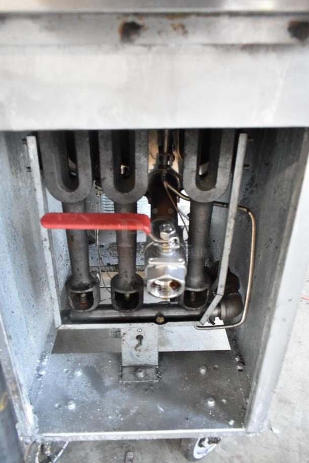 Sierra SRF-35/40NG stainless steel commercial natural gas fryer, 90,000 BTU, showing burner mechanism, used condition.