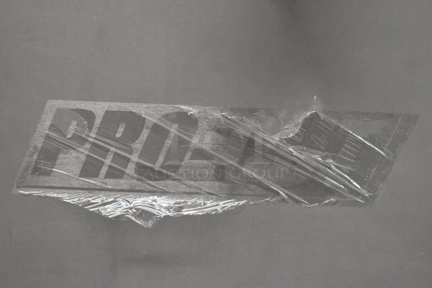 Pro-Cut KMG-32 logo on metal panel. New condition with protective wrap visible.