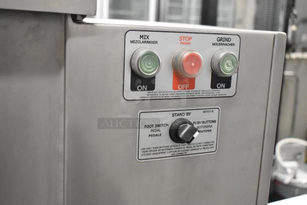 Pro-Cut KMG-32 electric meat grinder controls, featuring mix, stop, and grind buttons, in brand new condition.