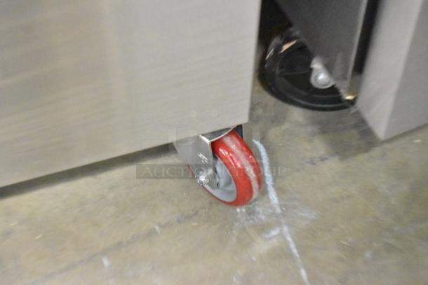 VacMaster VP540 chamber vacuum machine caster, red wheel on stainless steel frame, commercial use, 2025 model.