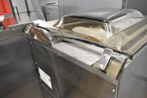 VacMaster VP540 stainless steel vacuum machine, new with dents, features two 20" seal bars, on casters, 110V, 1 phase.