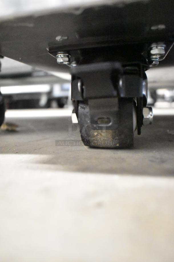 Brand new Atosa MBC50GR bottle cooler caster, black with mounting bolts. Commercial, scratch and dent condition.