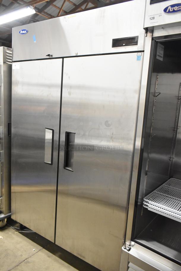 2021 Atosa MBF8002GR stainless steel commercial 2-door reach-in freezer. New, scratch and dent, poly coated racks, on casters.