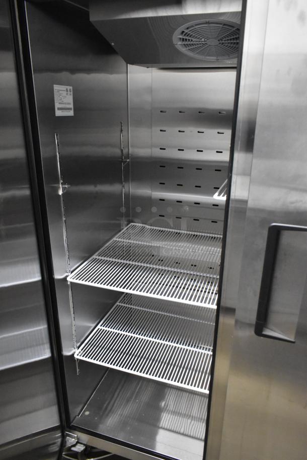 Atosa MBF8002GR stainless steel 2-door reach-in freezer, brand new with minor scratches, poly-coated racks, on casters.