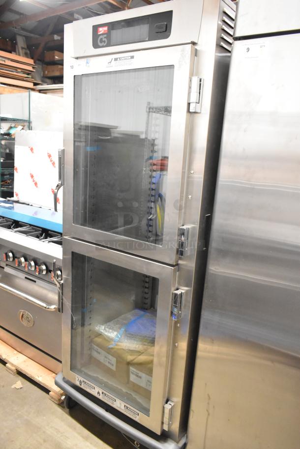 Metro C599-SDC-U stainless steel holding/proofing cabinet, 2022 model, scratch and dent, clear Dutch doors, commercial casters.