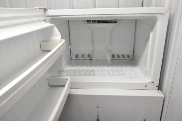 Hotpoint HTR16BBSARWW metal reach-in cooler with freezer, 115V, good condition, spacious interior with adjustable shelves.