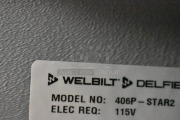 Label on 2023 Delfield 406P-STAR2 cooler showing model and 115V electrical requirement.