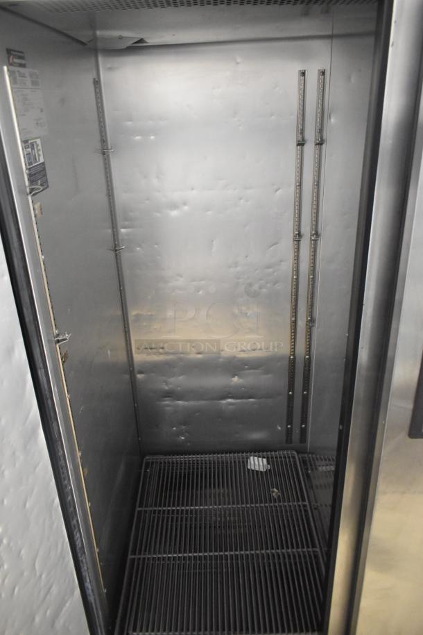 2018 True TG2R-2S-HC stainless steel 2-door reach-in cooler, poly-coated racks, interior view, 115 volts, 1 phase.