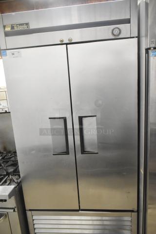 True T-35 Stainless Steel 2 Door Reach In Cooler, poly-coated racks, 115V, 1 phase, commercial use, excellent condition.