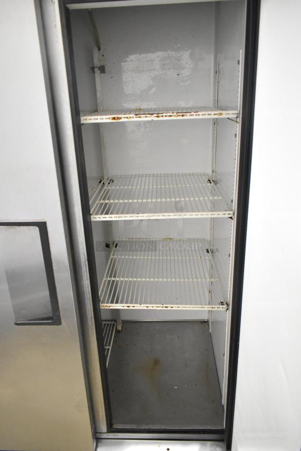 True T-35 stainless steel commercial cooler, two-door, poly-coated racks, 115V, some visible wear inside.