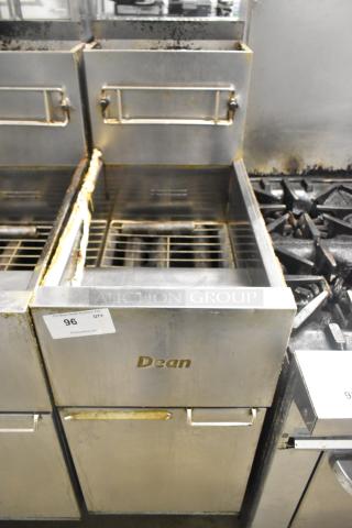 Dean SR42GN stainless steel commercial deep fat fryer, natural gas powered, 105,000 BTU, visible wear, model label displayed.