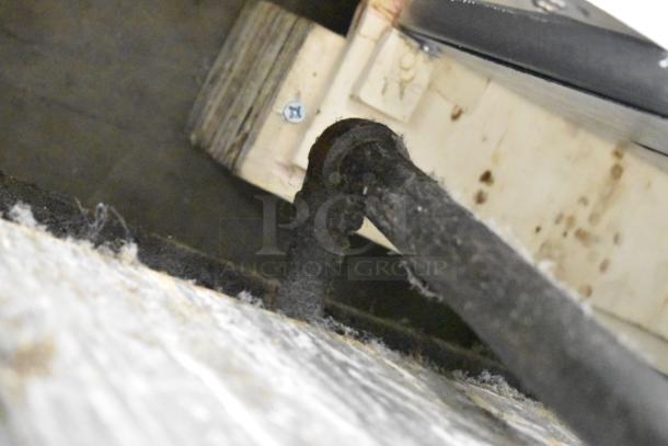 Dean SR42GN fryer, showing underside piping. 105,000 BTU, stainless steel, natural gas, commercial use.