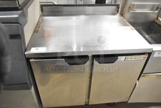 Beverage Air WTF36AHC stainless steel 2-door work top freezer on commercial casters. 115V, 1 phase. Minor wear visible.