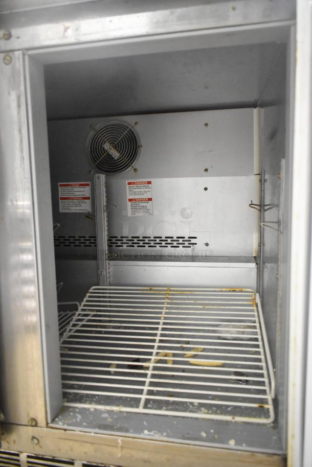 Beverage Air WTF36AHC stainless steel 2-door work top freezer, commercial casters, visible wear, 115 volts, 1 phase.