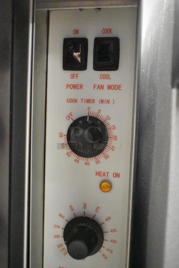 Cooking Performance Group 351FGC100DDN oven control panel with power, fan mode, timer, heat settings, and indicator light.