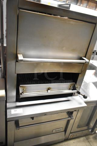 Garland stainless steel commercial gas vertical broiler; used condition, visible brand label, model suitable for restaurant use.