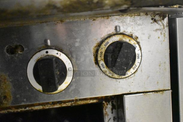 Garland Stainless Steel Commercial Gas Vertical Broiler, showing control knobs and temperature settings, used condition.