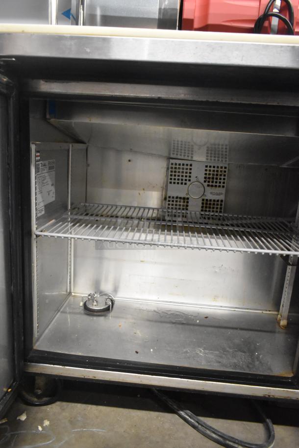 2017 True TSSU-60-10-HC stainless steel prep table, two-tier over shelf, bain marie, 115V, 1 phase, visible wear.